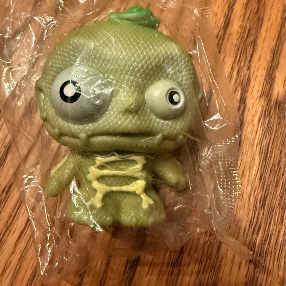 Green Creature Action Figure